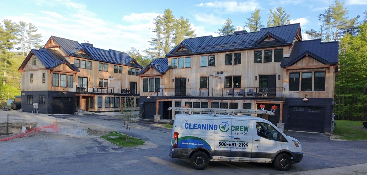 Crew van outside new construction townhomes